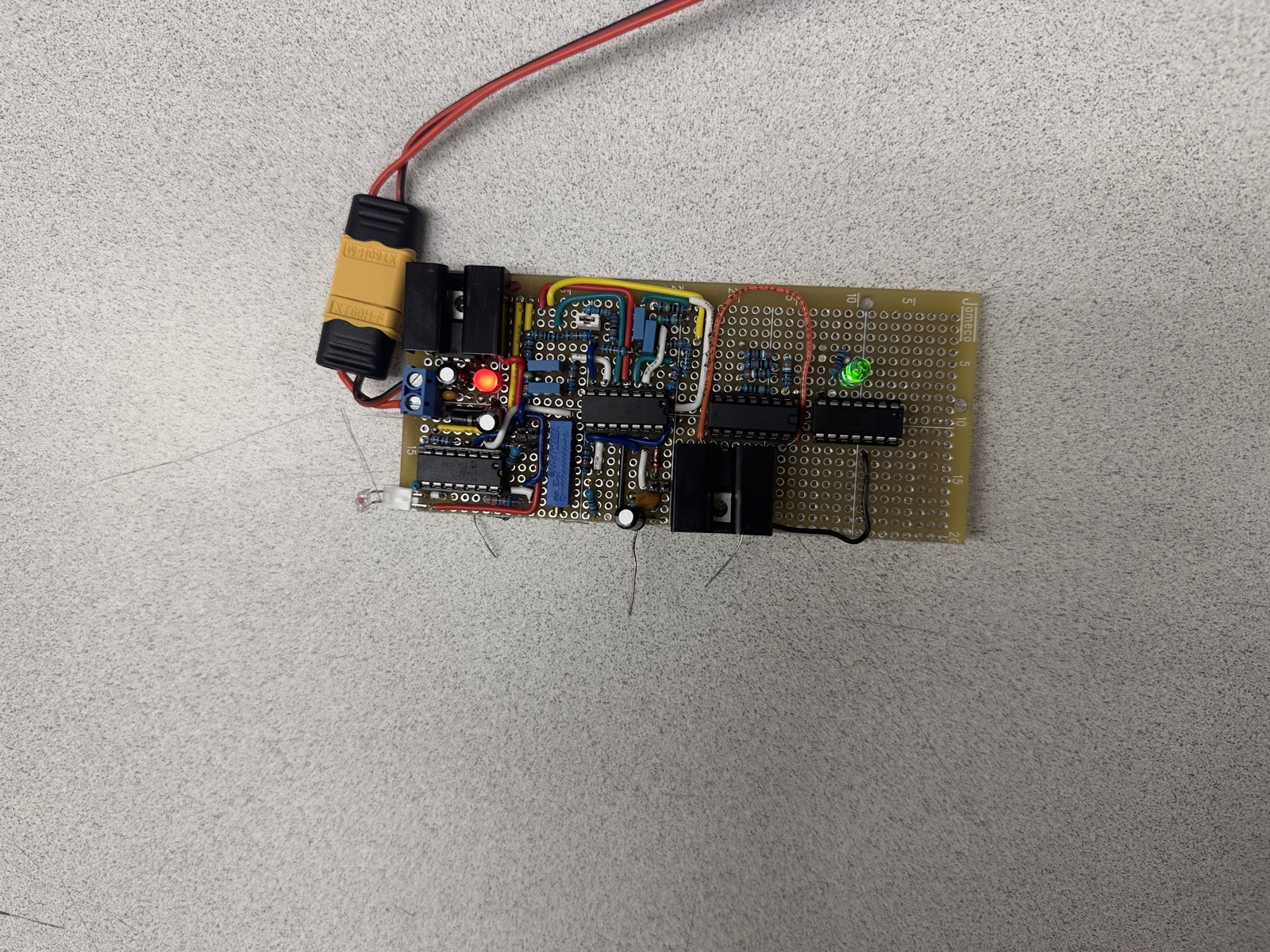 Hand-soldered analog filter circuit on a protoboard